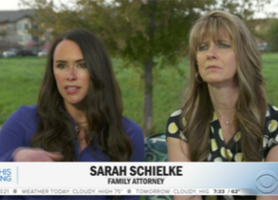 Sarah of The Life and Liberty Law Office, a Civil Rights attorney sits with her clients on a CBS News interview.